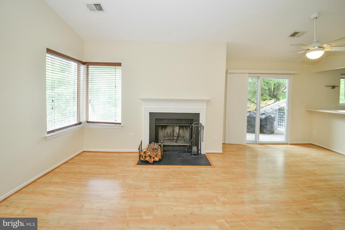 11743 Summerchase Circle, Unit B Reston, VA 20194 - Photo 4 of 24 a view of a livingroom with a fireplace