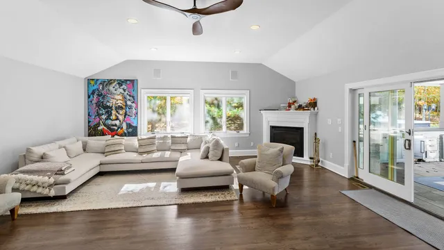 a living room with furniture or couch and a fireplace