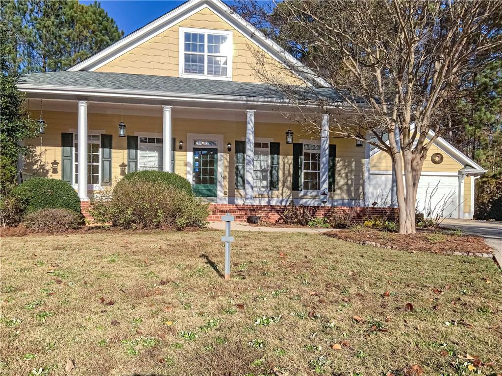 front view of a house with a yard