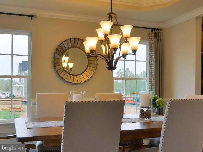2643 St Marys View Road Accokeek, MD 20607 - Photo 4 of 20 a dining room with furniture and a window