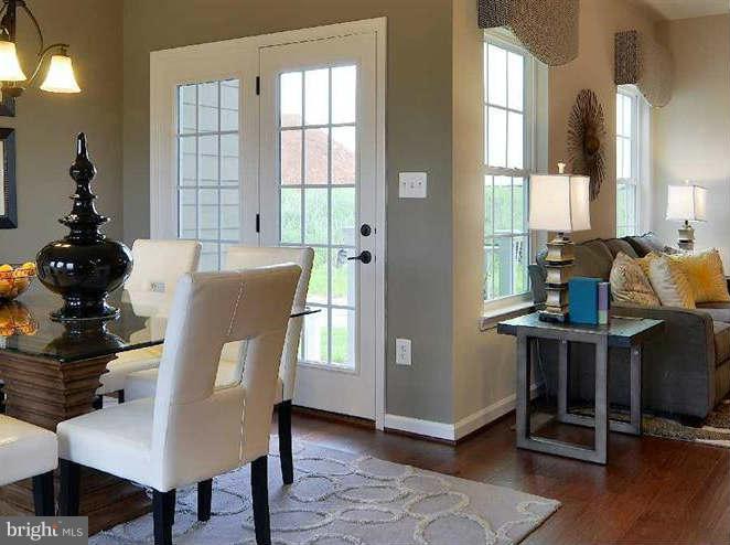 2643 St Marys View Road Accokeek, MD 20607 - Photo 5 of 20 a living room with furniture and wooden floor