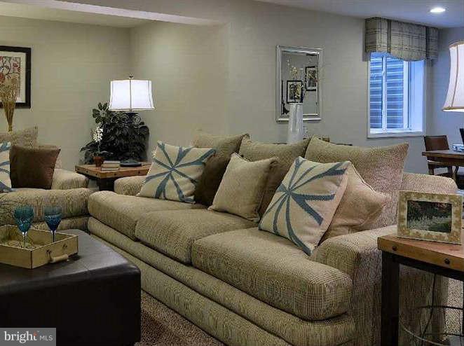 2643 St Marys View Road Accokeek, MD 20607 - Photo 9 of 20 a living room with furniture and a window