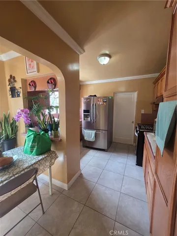 a view of a hallway with seating space