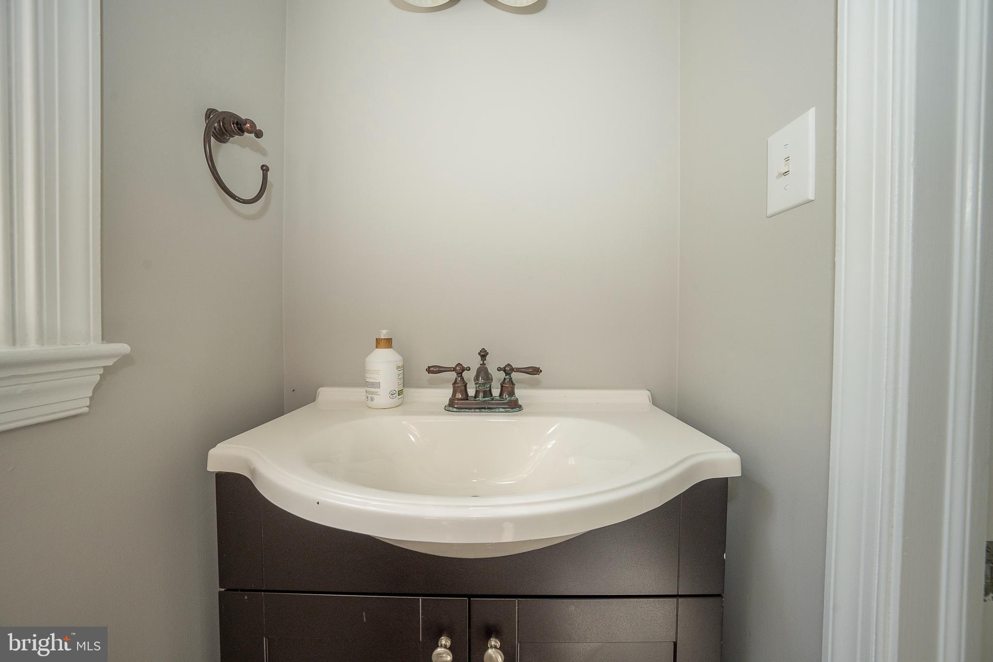 820 Milmar Road Newtown Square, PA 19073 - Photo 12 of 32 a bathroom with a sink and mirror