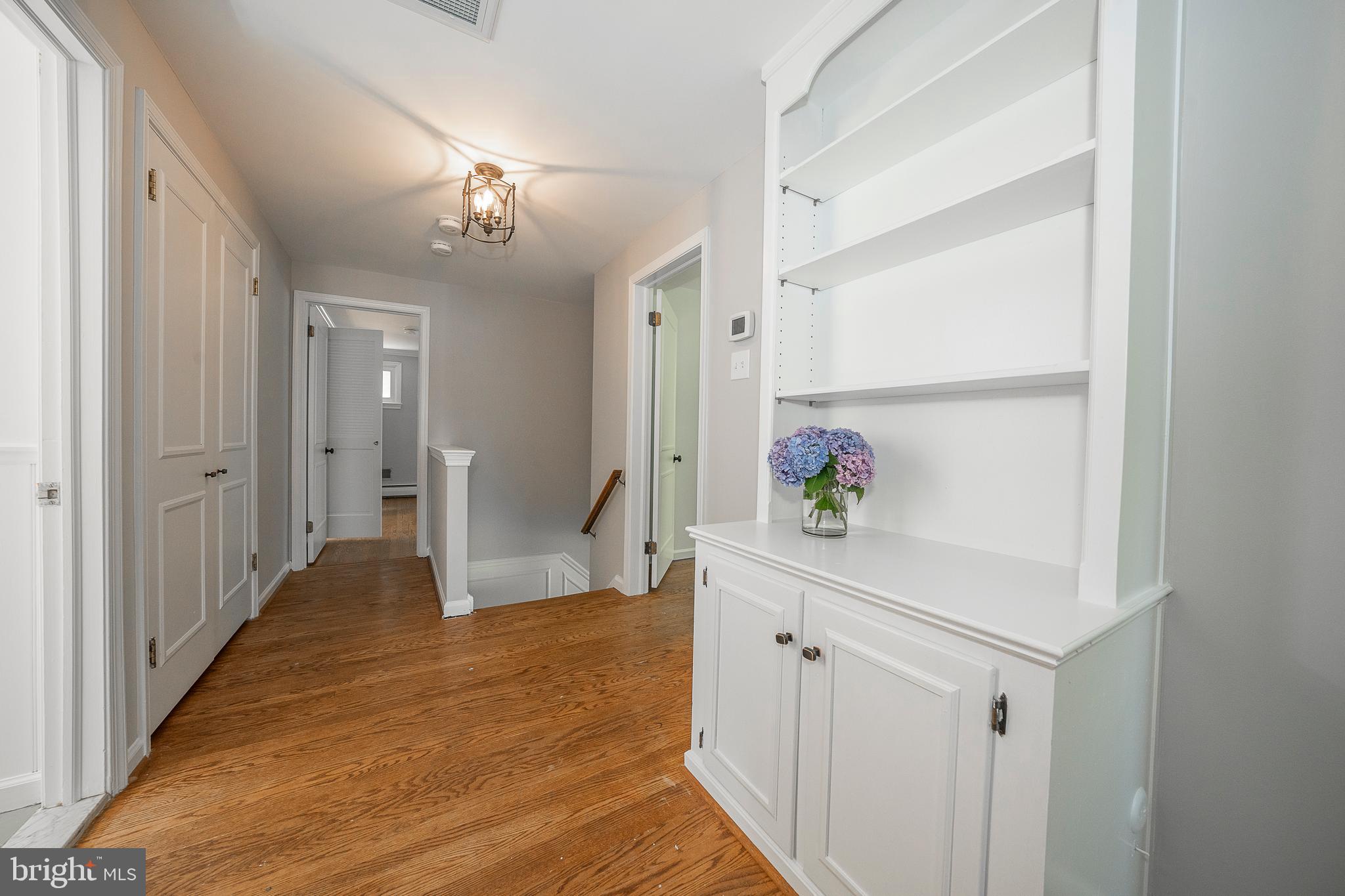 820 Milmar Road Newtown Square, PA 19073 - Photo 18 of 32 a view of hallway with wooden floor