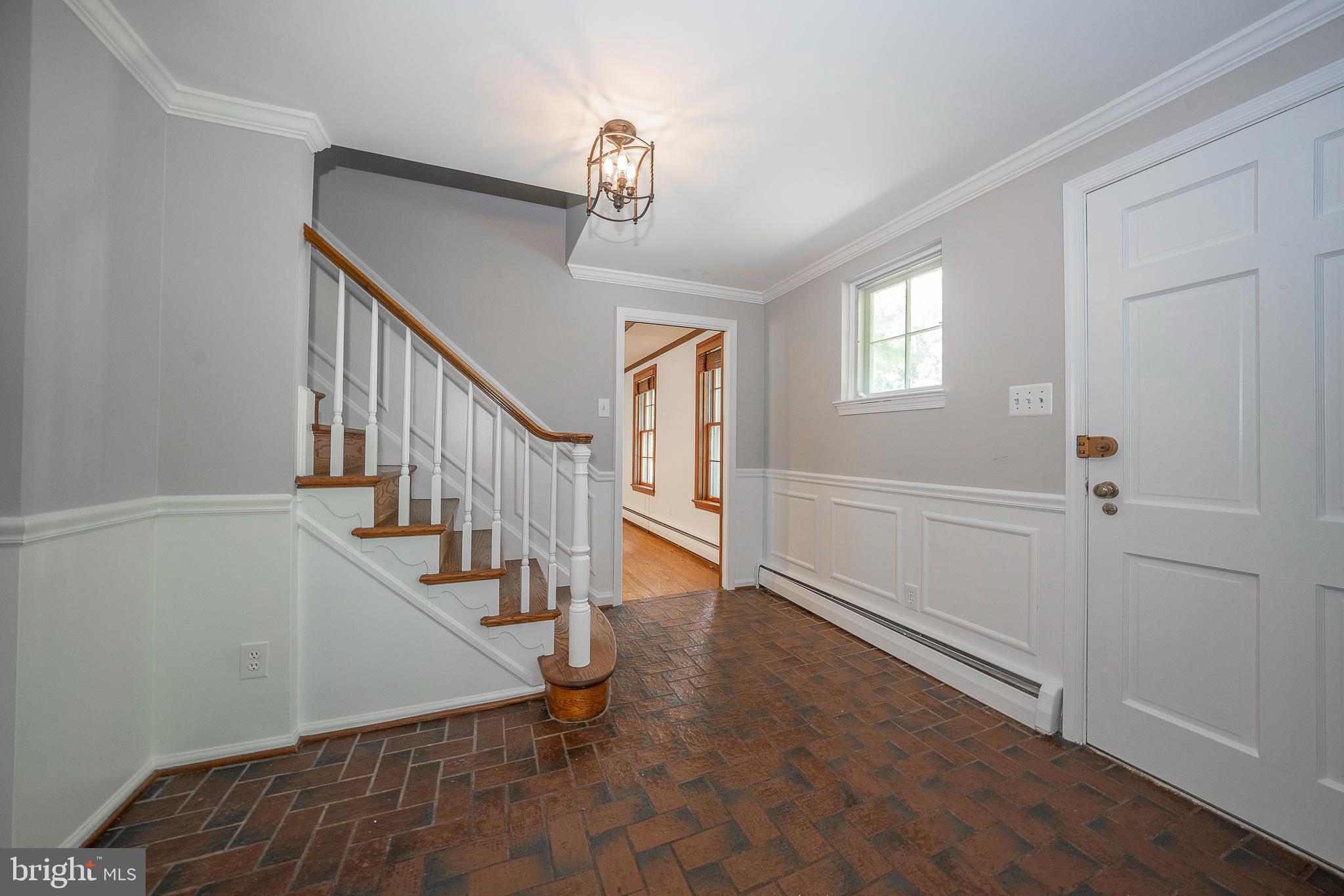 820 Milmar Road Newtown Square, PA 19073 - Photo 2 of 32 a view of entryway and hall with wooden floor