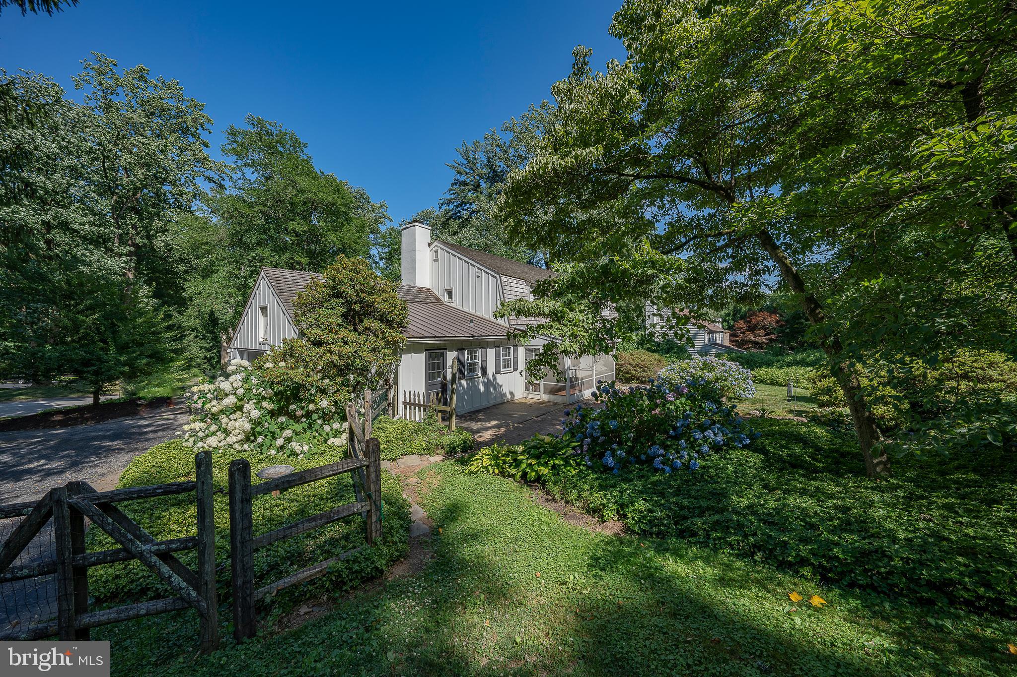 820 Milmar Road Newtown Square, PA 19073 - Photo 29 of 32 a view of a house with a yard and sitting area