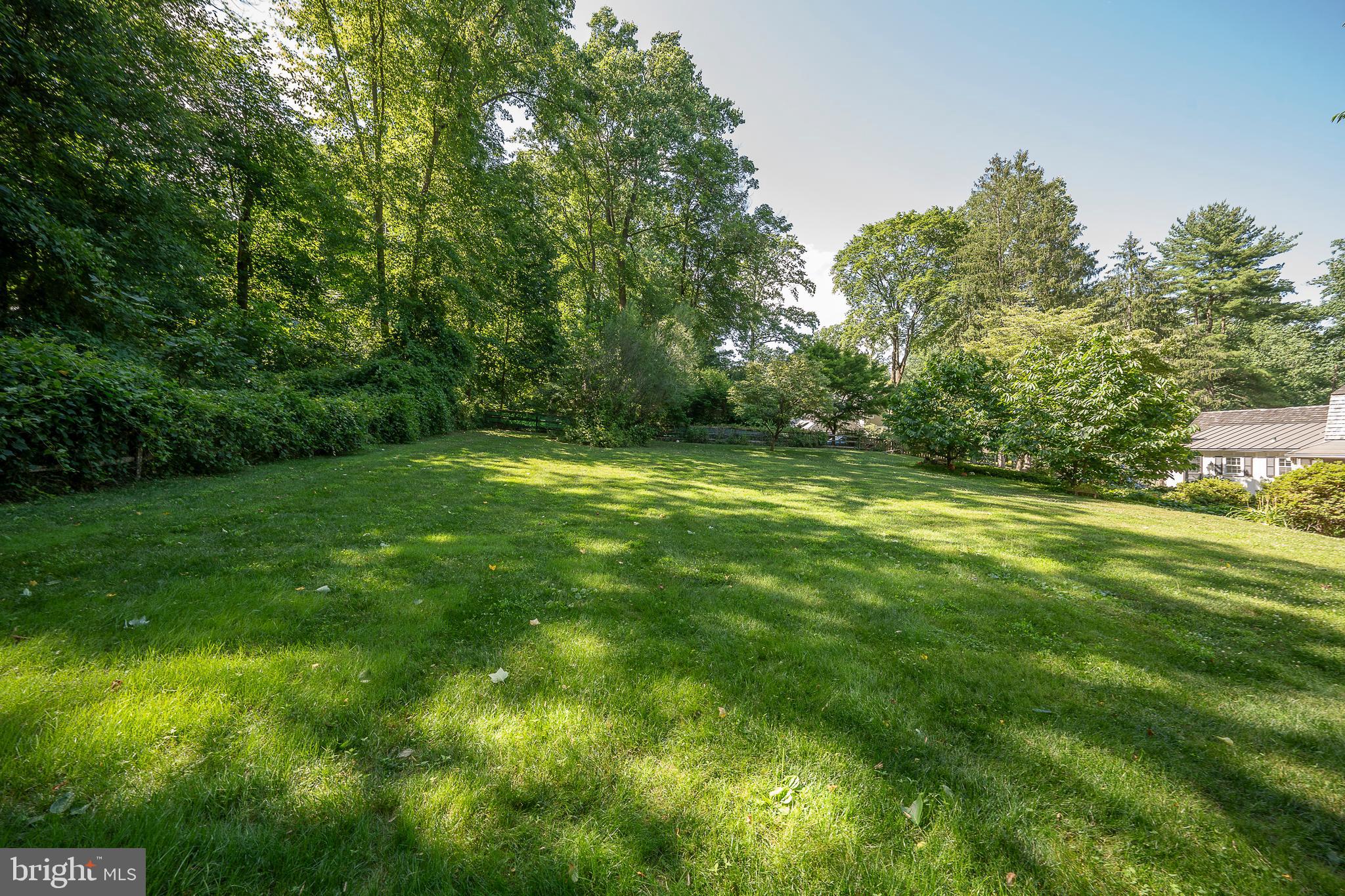 820 Milmar Road Newtown Square, PA 19073 - Photo 30 of 32 a view of a grassy field with trees