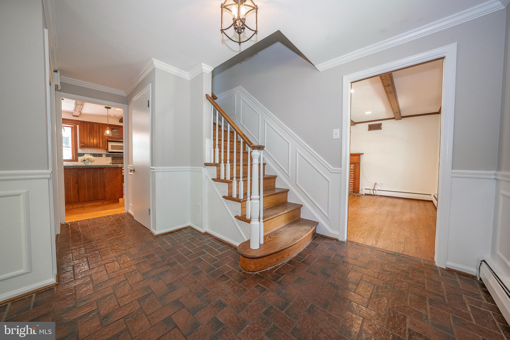 820 Milmar Road Newtown Square, PA 19073 - Photo 3 of 32 a view of entryway and hall with wooden floor