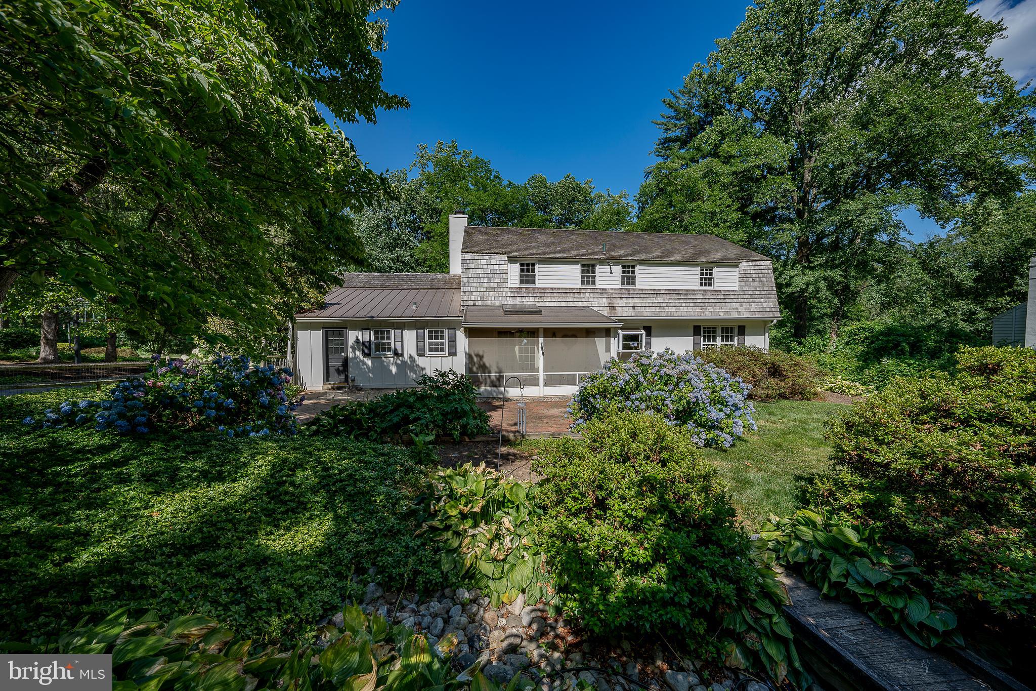 820 Milmar Road Newtown Square, PA 19073 - Photo 31 of 32 a front view of a house with a yard
