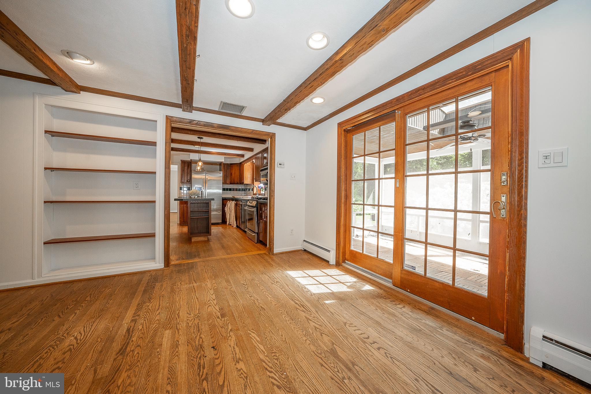 820 Milmar Road Newtown Square, PA 19073 - Photo 7 of 32 a view of empty room with wooden floor and fan