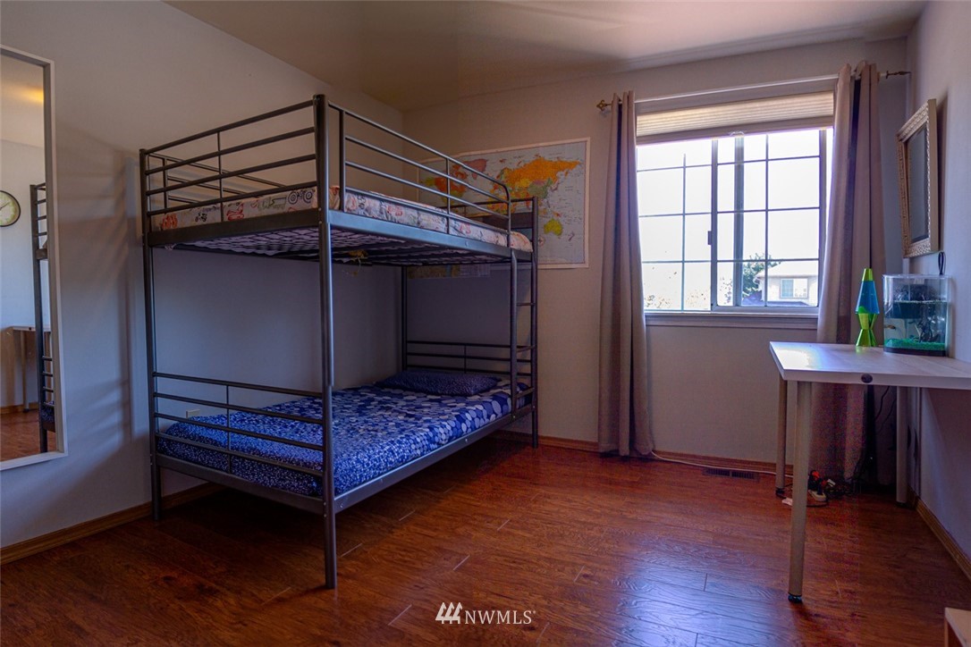 33027 20th Place Southwest Federal Way, WA 98023 - Photo 12 of 23 a bedroom with a bunk bed and a window