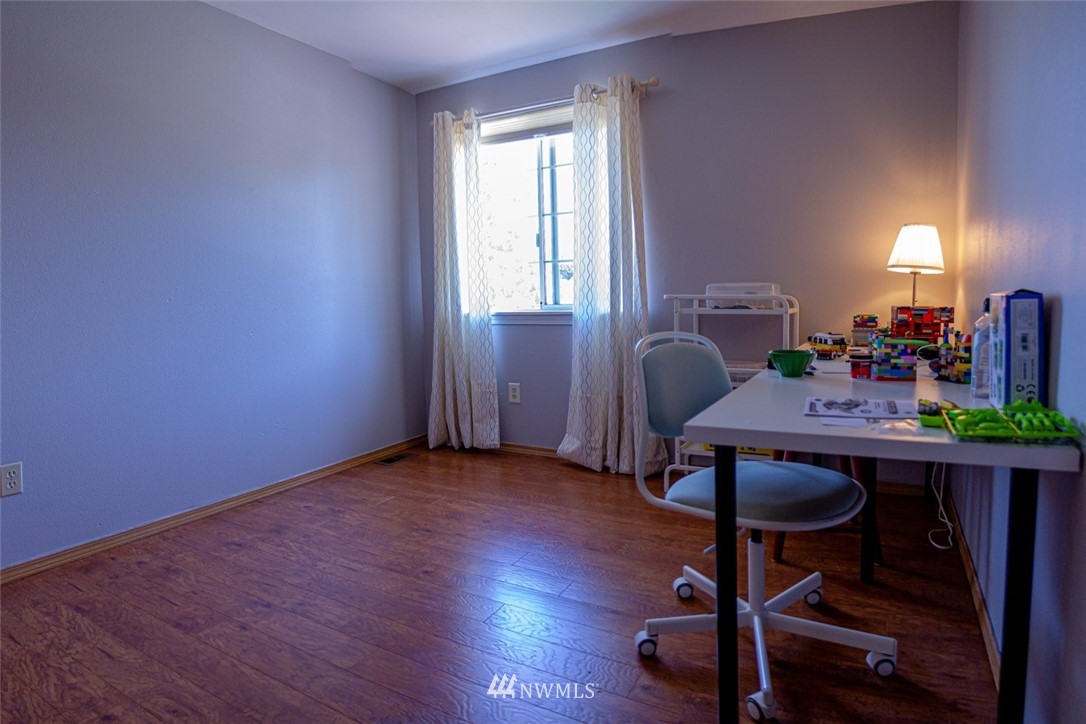 33027 20th Place Southwest Federal Way, WA 98023 - Photo 14 of 23 a view of a workspace with furniture and a window