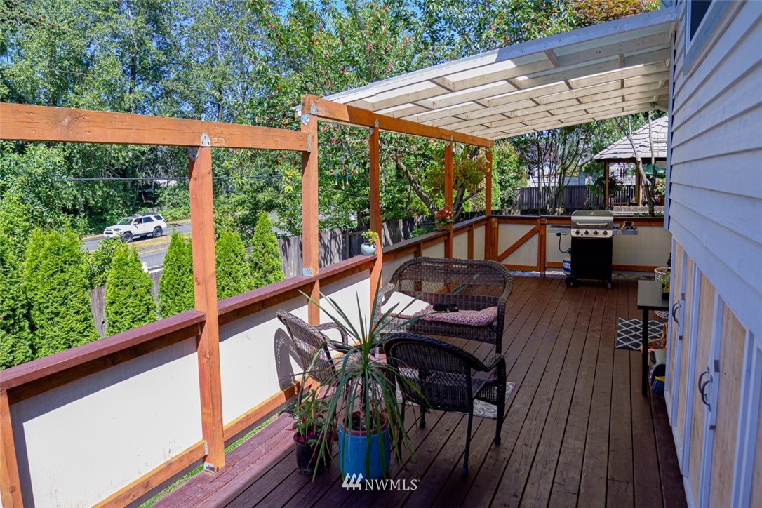 33027 20th Place Southwest Federal Way, WA 98023 - Photo 18 of 23 a view of balcony with furniture and wooden deck