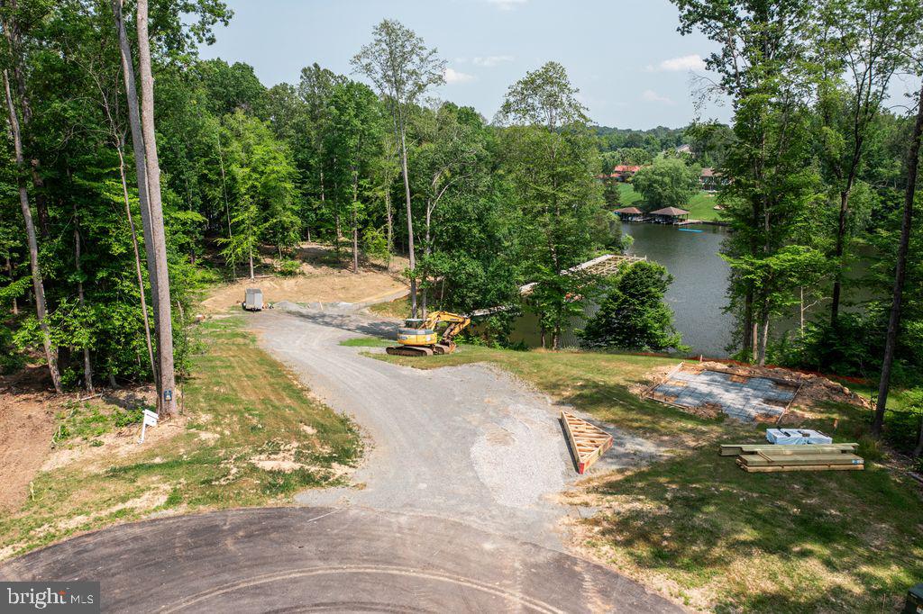 61 Compass Cove Mineral, VA 23117 - Photo 11 of 15 a view of a yard with plants and large trees