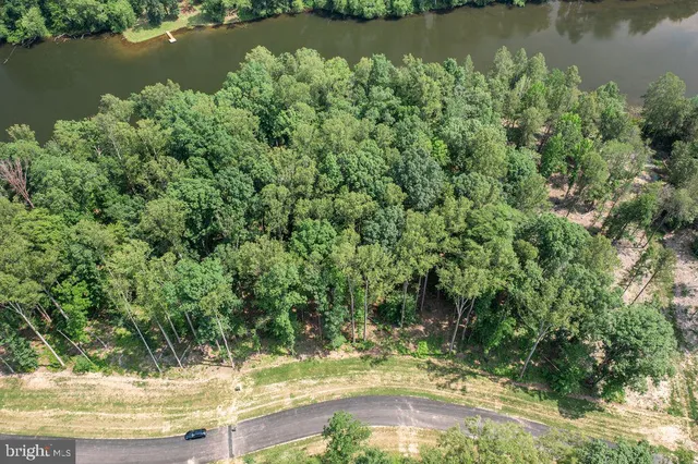 a view of a wooden floor and a lake view