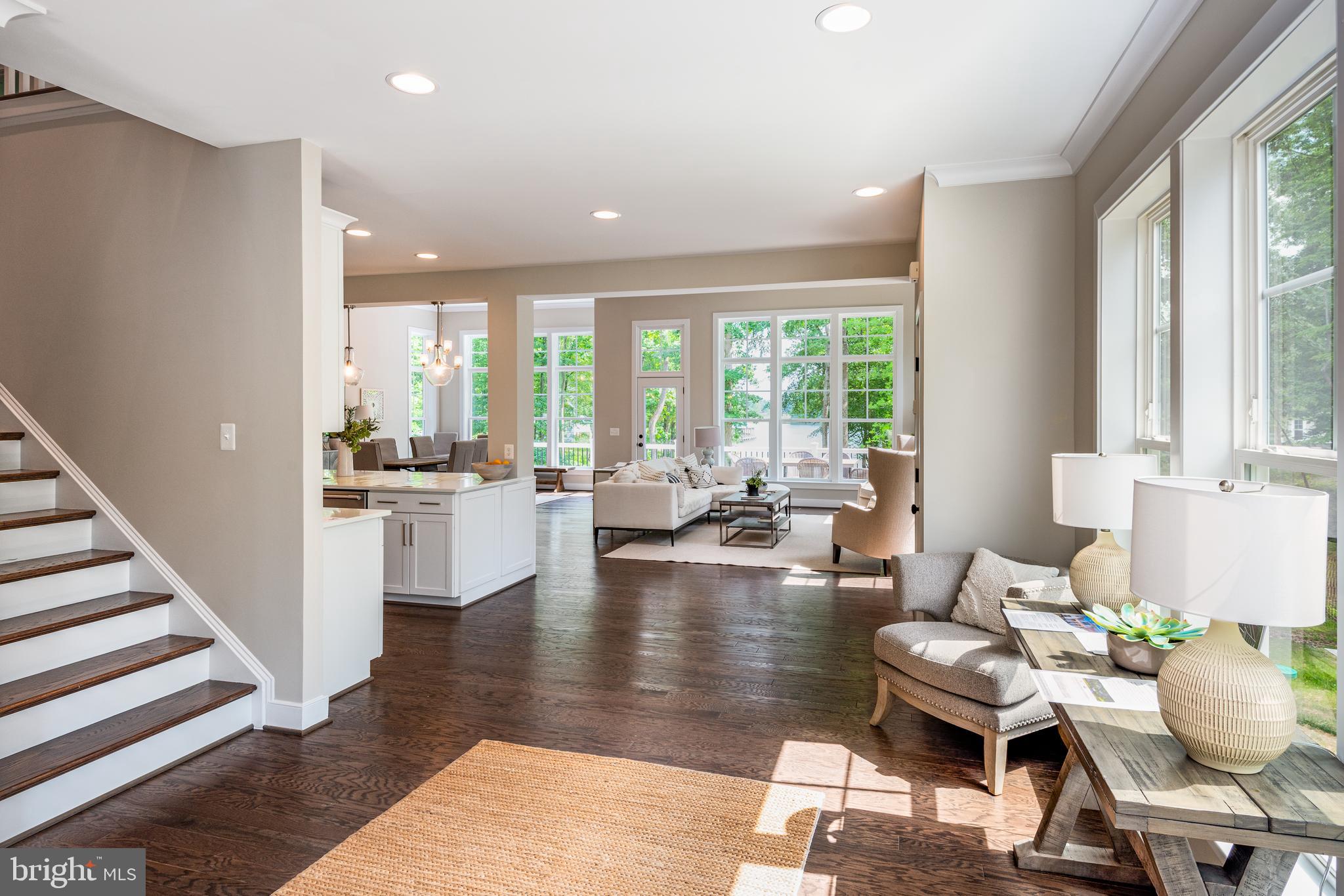 61 Compass Cove Mineral, VA 23117 - Photo 2 of 15 a living room with fireplace furniture and a large window