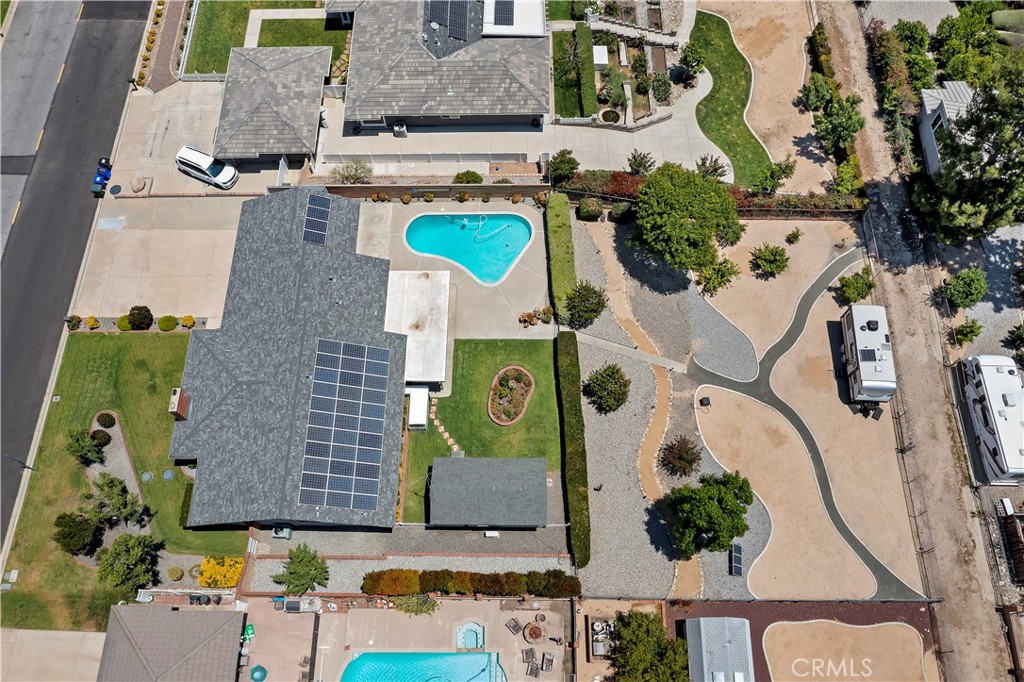 8527 Hillside Road Rancho Cucamonga, CA 91701 - Photo 41 of 50 an aerial view of residential house with outdoor space and parking