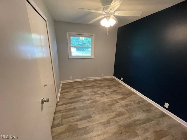2345 Antioch Road Perry, OH 44081 - Photo 10 of 17 Hardwood floored spare room with ceiling fan