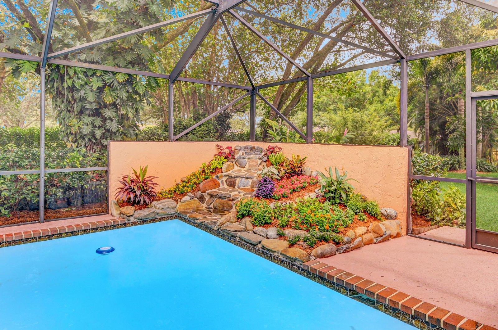 22690 Lemon Tree Lane Boca Raton, FL 33428 - Photo 26 of 29 Waterfall into pool