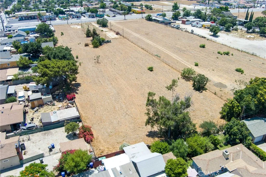 17848 Foothill Boulevard Fontana, CA 92336 - Photo 4 of 9 an aerial view of residential houses with outdoor space