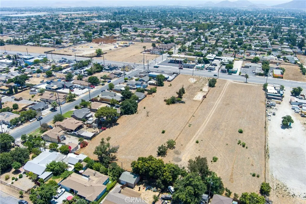 17848 Foothill Boulevard Fontana, CA 92336 - Photo 7 of 9 an aerial view of residential houses with outdoor space