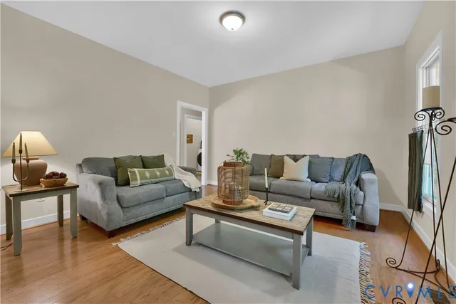 a living room with furniture and a couch