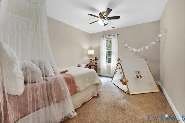 a work room with furniture and windows