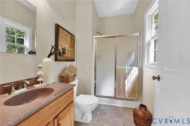 a view of an empty room with a couch