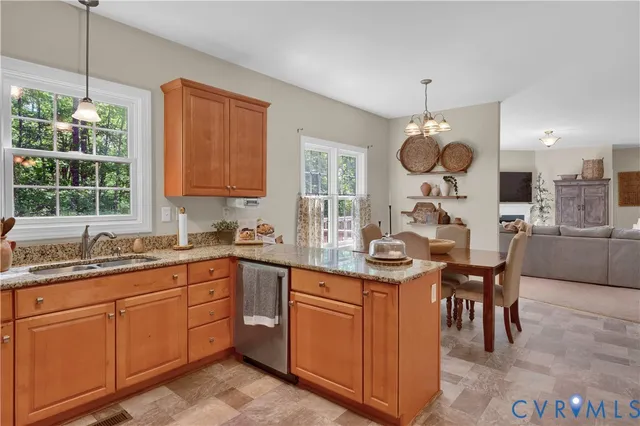 a kitchen with a sink and microwave