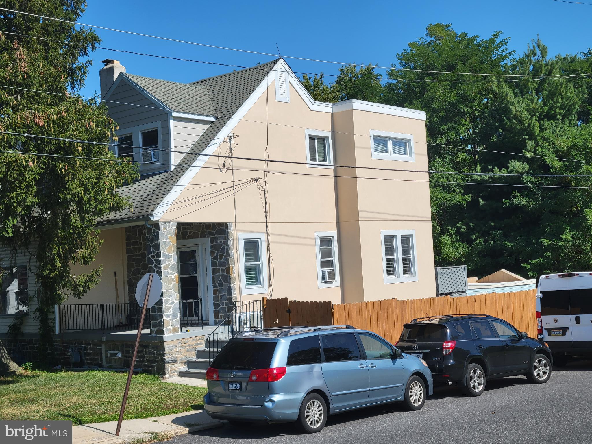 a car parked in front of a house