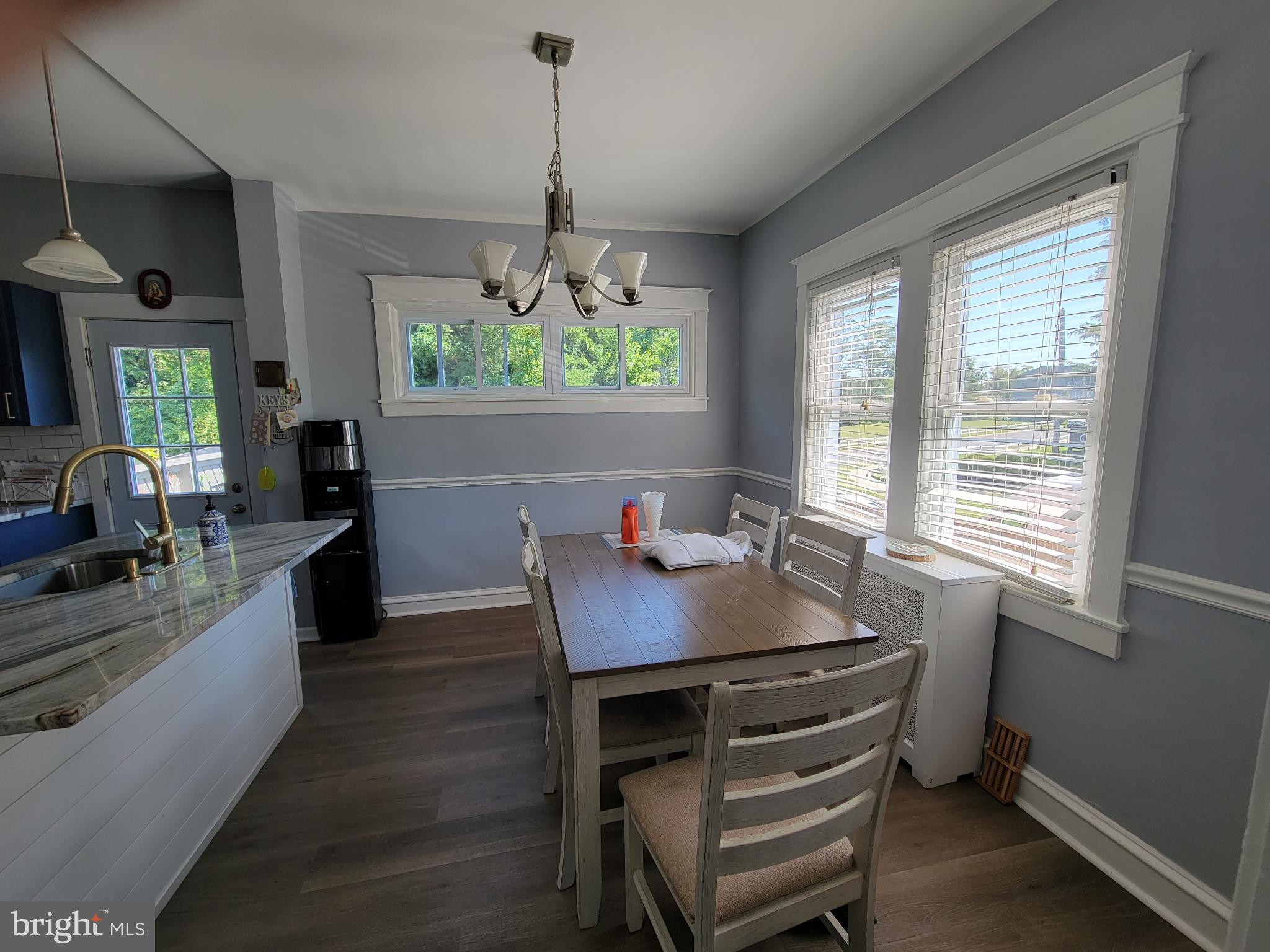 1101 Wilson Drive Havertown, PA 19083 - Photo 11 of 26 a view of a dining room with furniture window and wooden floor