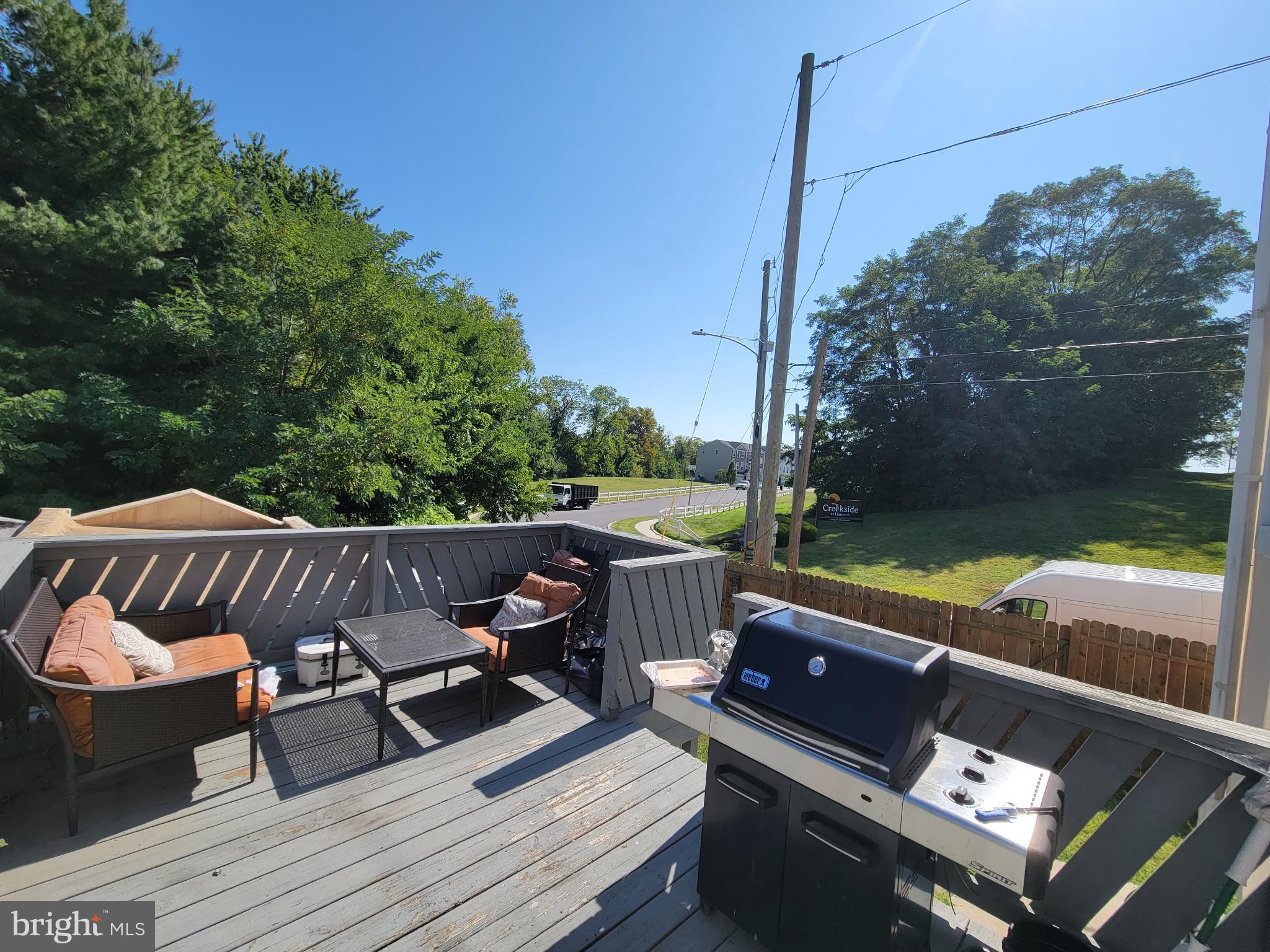 1101 Wilson Drive Havertown, PA 19083 - Photo 8 of 26 a view of a chairs and table on the deck