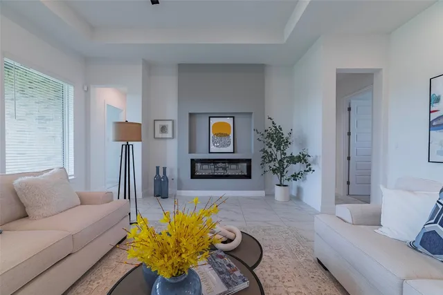 a living room with furniture and a couch