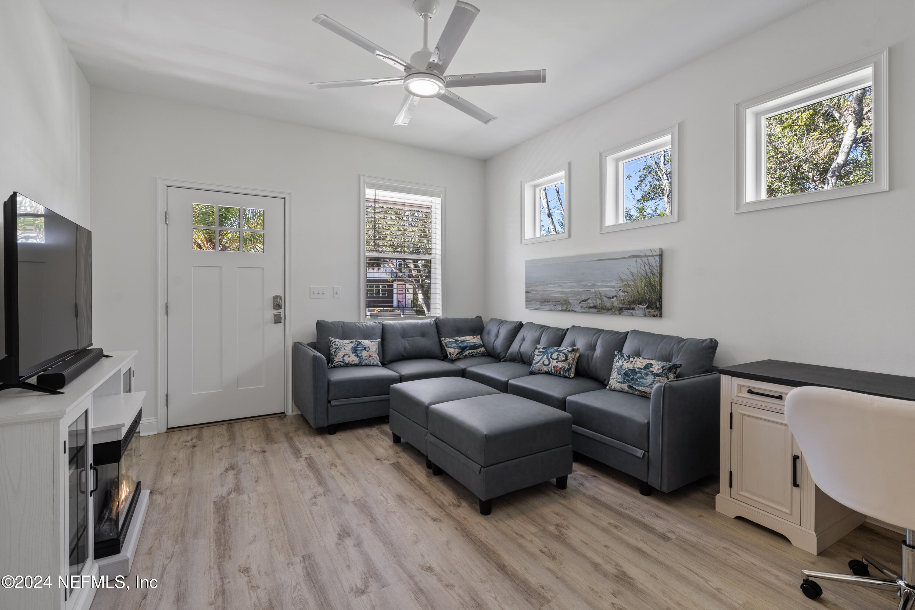 249 Riberia Street St. Augustine, FL 32084 - Photo 2 of 36 a living room with furniture and a flat screen tv