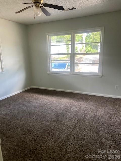 318 Salisbury Road Statesville, NC 28677 - Photo 4 of 6 an empty room with a window