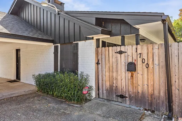 a view of a house with a small garden