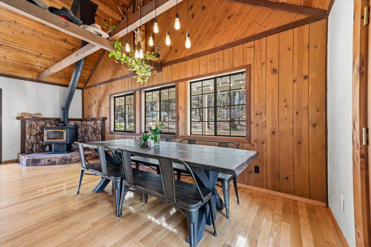 11403 Woodacre Road Grass Valley, CA 95949 - Photo 14 of 69 a view of a dining room with furniture window and wooden floor