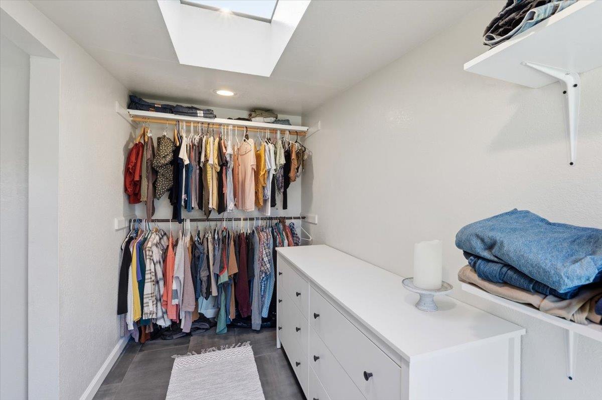 11403 Woodacre Road Grass Valley, CA 95949 - Photo 33 of 69 a view of walk in closet with clothes