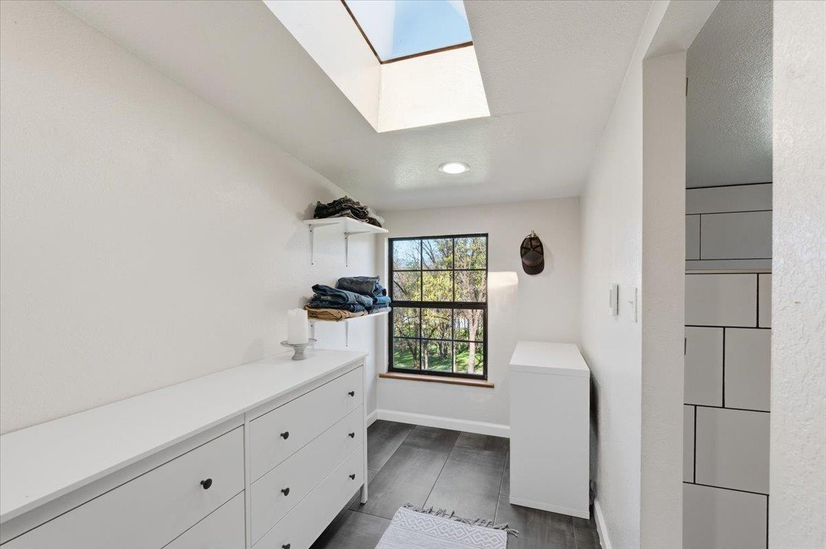 11403 Woodacre Road Grass Valley, CA 95949 - Photo 34 of 69 a bathroom with a bathtub and shower