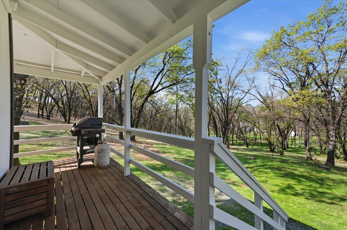 11403 Woodacre Road Grass Valley, CA 95949 - Photo 37 of 69 a sitting area with view of trees in the background