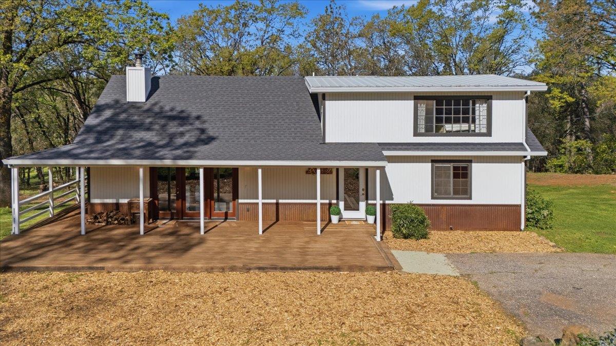 11403 Woodacre Road Grass Valley, CA 95949 - Photo 40 of 69 front view of a house with a yard