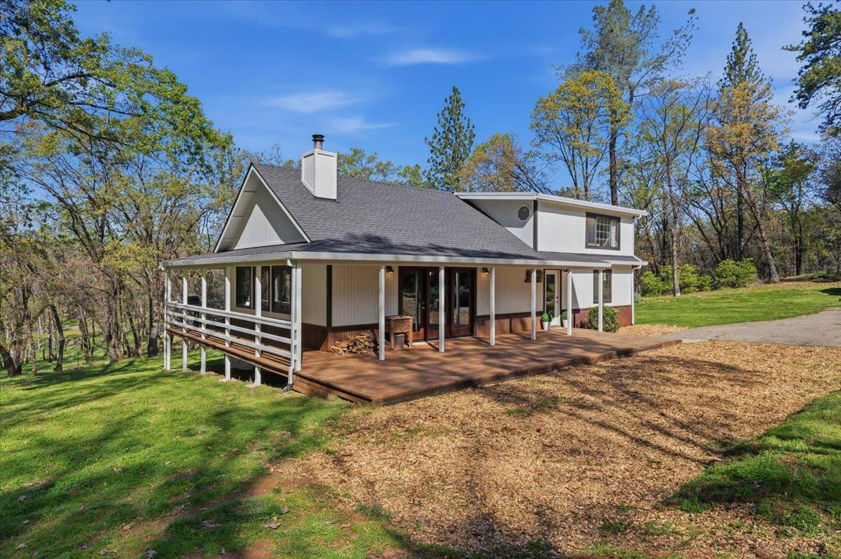 11403 Woodacre Road Grass Valley, CA 95949 - Photo 41 of 69 a front view of a house with a yard