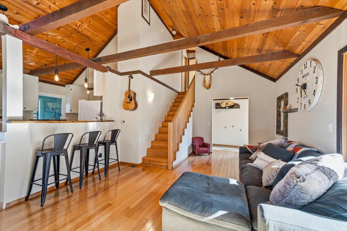 11403 Woodacre Road Grass Valley, CA 95949 - Photo 5 of 69 a living room with furniture and wooden floor