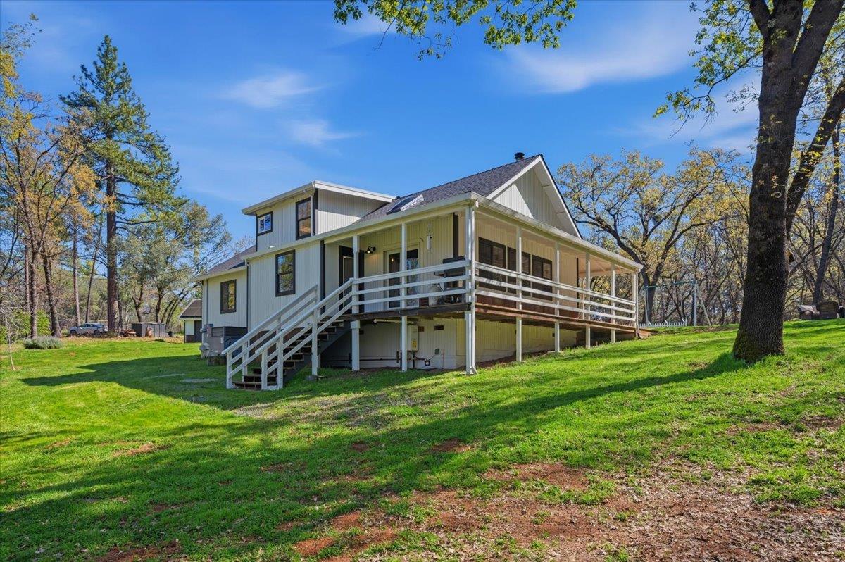 11403 Woodacre Road Grass Valley, CA 95949 - Photo 55 of 69 a view of a house with a yard