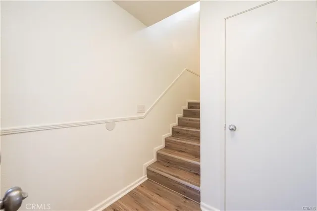 a view of entryway with wooden floor