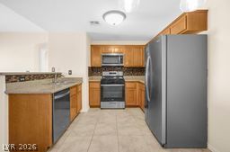 7701 West Robindale Road, Unit 277 Las Vegas, NV 89113 - Photo 7 of 33 A well-appointed kitchen features stainless steel appliances and abundant cabinetry.