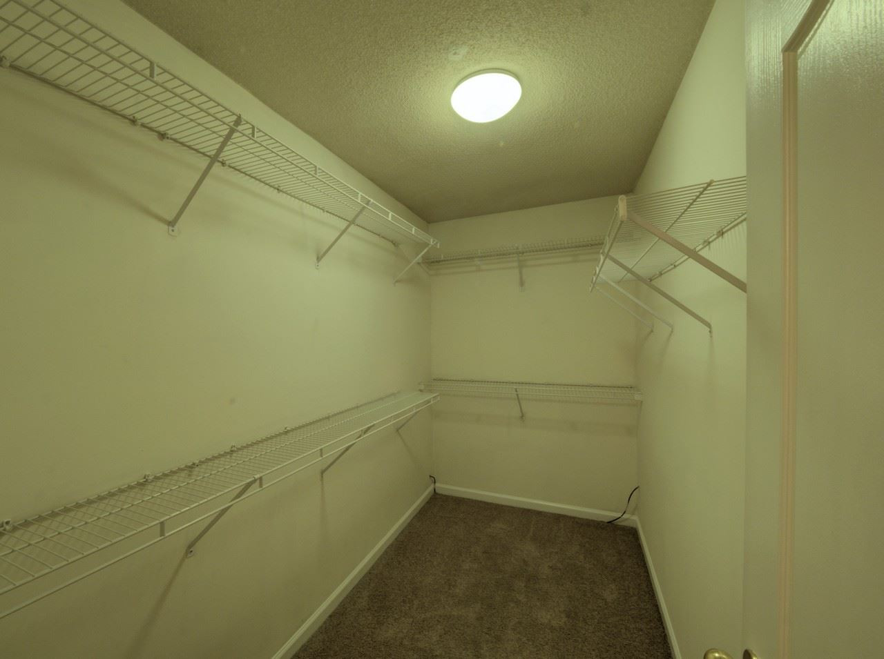5529 Wedgegate Drive Raleigh, NC 27616 - Photo 15 of 21 Master Closet