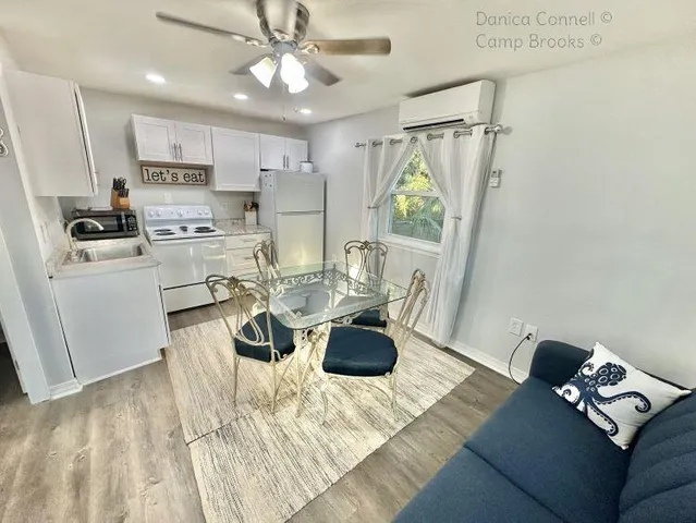 a living room with furniture and a table