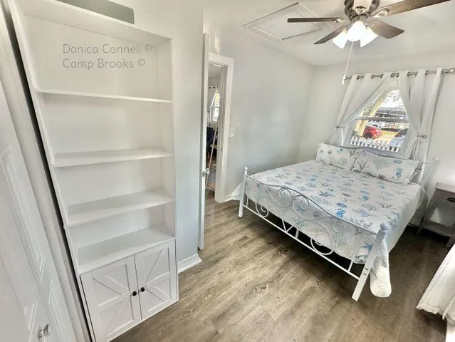 a bedroom with a bed and a dresser